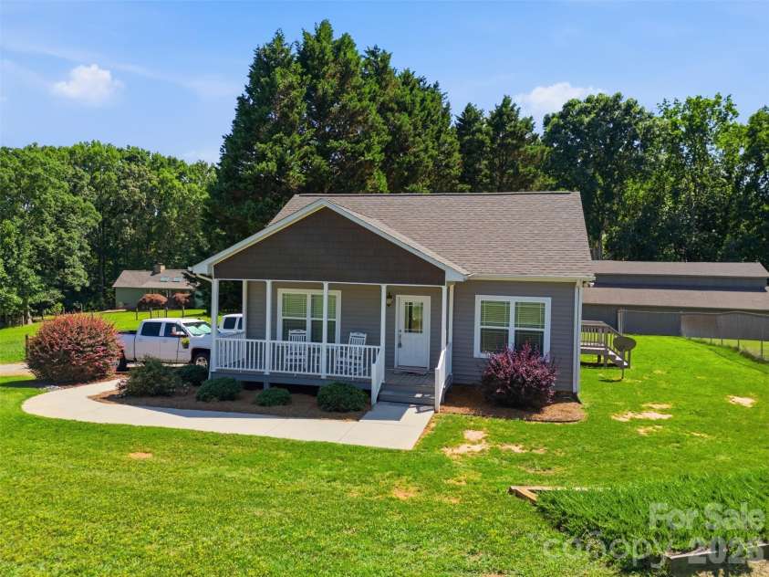 4242 John Ritchie Road, Iron Station, NC 28080.  MLS# CAR4350188, YatesRealty ID 9296. Guest Home 996 sq/ft