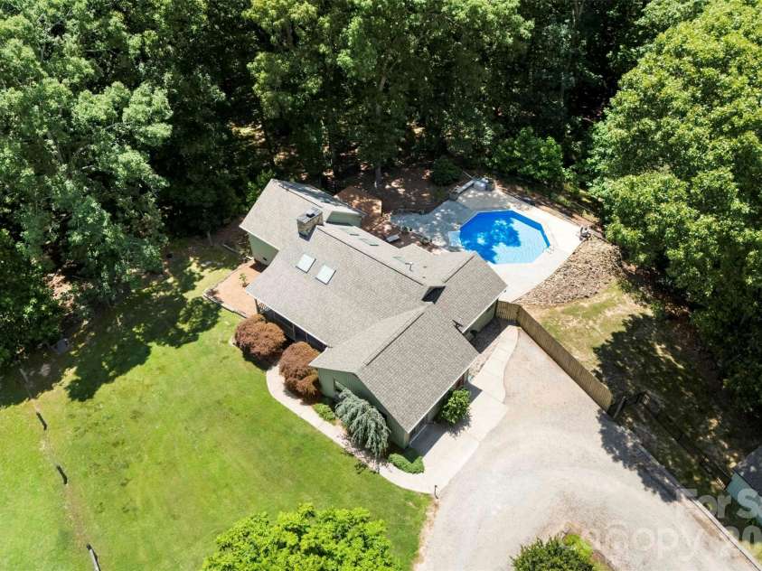 4242 John Ritchie Road, Iron Station, NC 28080.  MLS# CAR4350188, YatesRealty ID 9296. Salt Water In-ground Pool