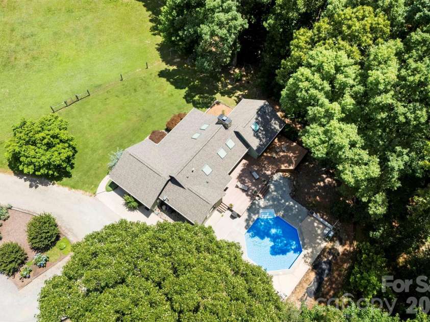 4242 John Ritchie Road, Iron Station, NC 28080.  MLS# CAR4350188, YatesRealty ID 9296. Salt Water in-ground pool OPEN