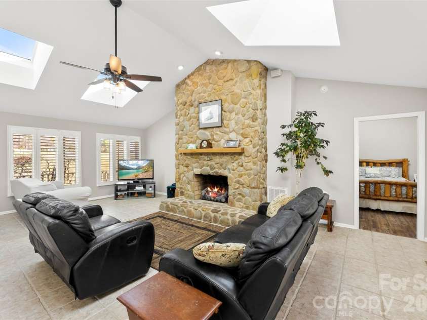 4242 John Ritchie Road, Iron Station, NC 28080.  MLS# CAR4350188, YatesRealty ID 9296. Skylights w/retractable solar shades
