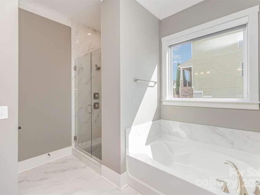 123 Farm Knoll Way, Mooresville, NC 28117.  MLS# CAR4239025, YatesRealty ID 9297. Primary bath with soaking tub and walk in shower