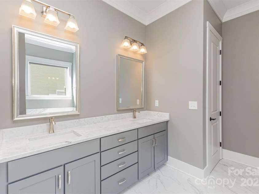 123 Farm Knoll Way, Mooresville, NC 28117.  MLS# CAR4239025, YatesRealty ID 9297. Primary bathroom with dual vanities