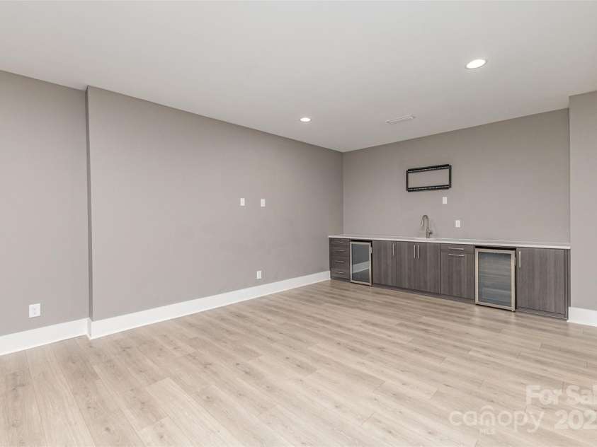 123 Farm Knoll Way, Mooresville, NC 28117.  MLS# CAR4239025, YatesRealty ID 9297. Theatre in lower level
