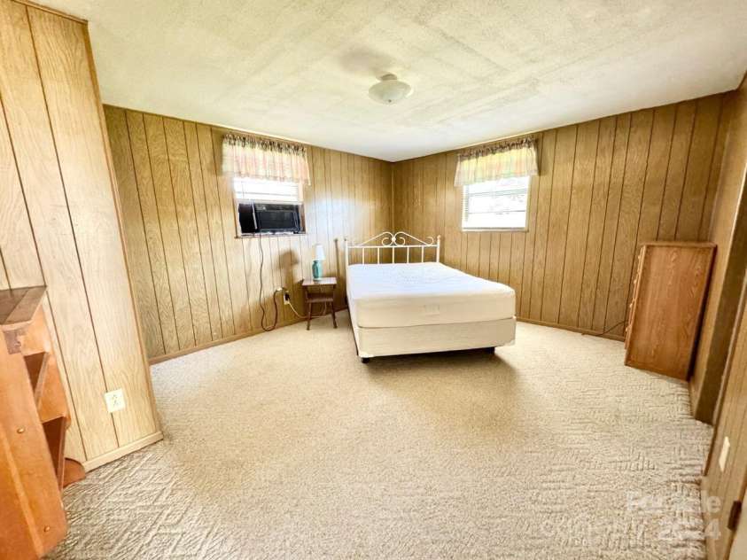 565 Neely Road, Brevard, NC 28712.  MLS# CAR4074647, YatesRealty ID 9297. Apartment #2 Bedroom