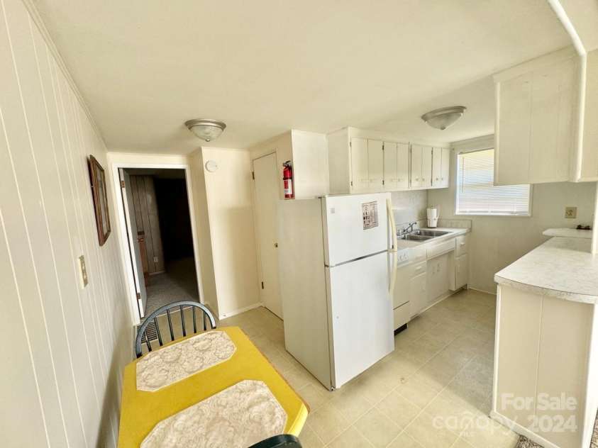 565 Neely Road, Brevard, NC 28712.  MLS# CAR4074647, YatesRealty ID 9297. Apartment #2 Kitchen