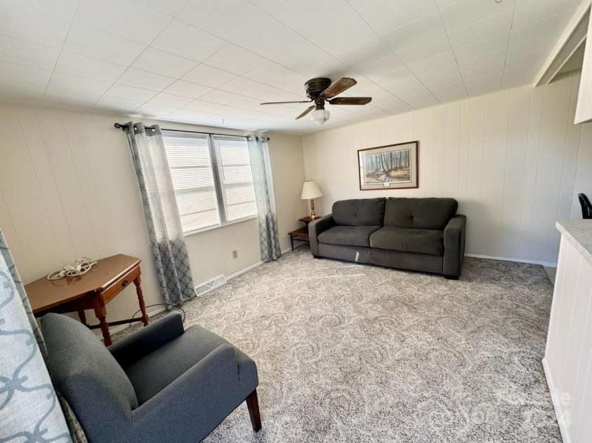 565 Neely Road, Brevard, NC 28712.  MLS# CAR4074647, YatesRealty ID 9297. Apartment #2 LR