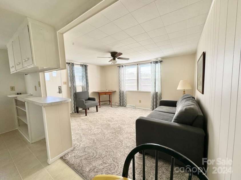 565 Neely Road, Brevard, NC 28712.  MLS# CAR4074647, YatesRealty ID 9297. Apartment#2 Kitchen to LR