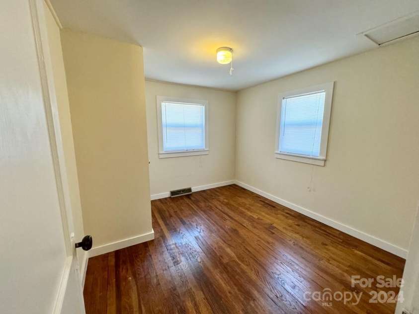 565 Neely Road, Brevard, NC 28712.  MLS# CAR4074647, YatesRealty ID 9297. Main Home Bedroom #2