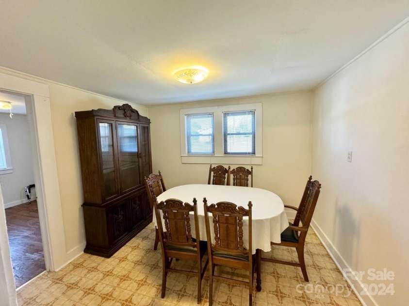 565 Neely Road, Brevard, NC 28712.  MLS# CAR4074647, YatesRealty ID 9297. Main Home DiningMulti-Purpose Room