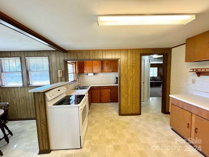 565 Neely Road, Brevard, NC 28712.  MLS# CAR4074647, YatesRealty ID 9297. Main Home Kitchen