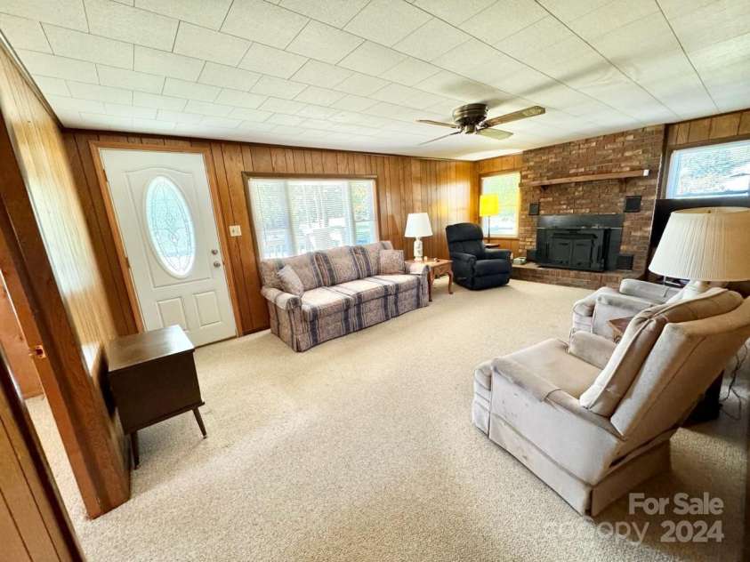 565 Neely Road, Brevard, NC 28712.  MLS# CAR4074647, YatesRealty ID 9297. Main Home LR