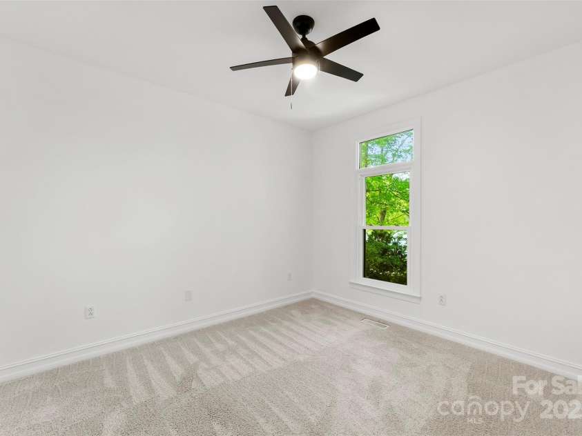 15838 Pineknoll Lane, Huntersville, NC 28078.  MLS# CAR4251643, YatesRealty ID 9298. Third bedroom overlooking the lake