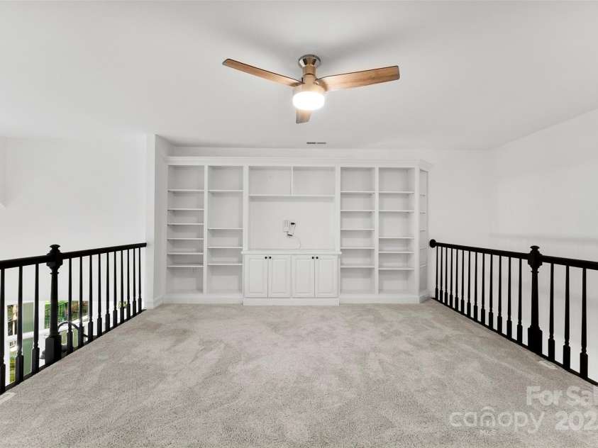 15838 Pineknoll Lane, Huntersville, NC 28078.  MLS# CAR4251643, YatesRealty ID 9298. Upstairs loft overlooking the living room