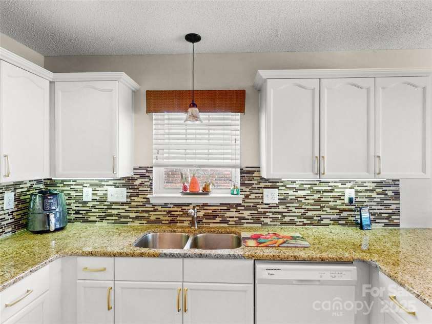 115 Keswick Lane, Mooresville, NC 28117.  MLS# CAR4245086, YatesRealty ID 9299. A window over the sink for extra light!