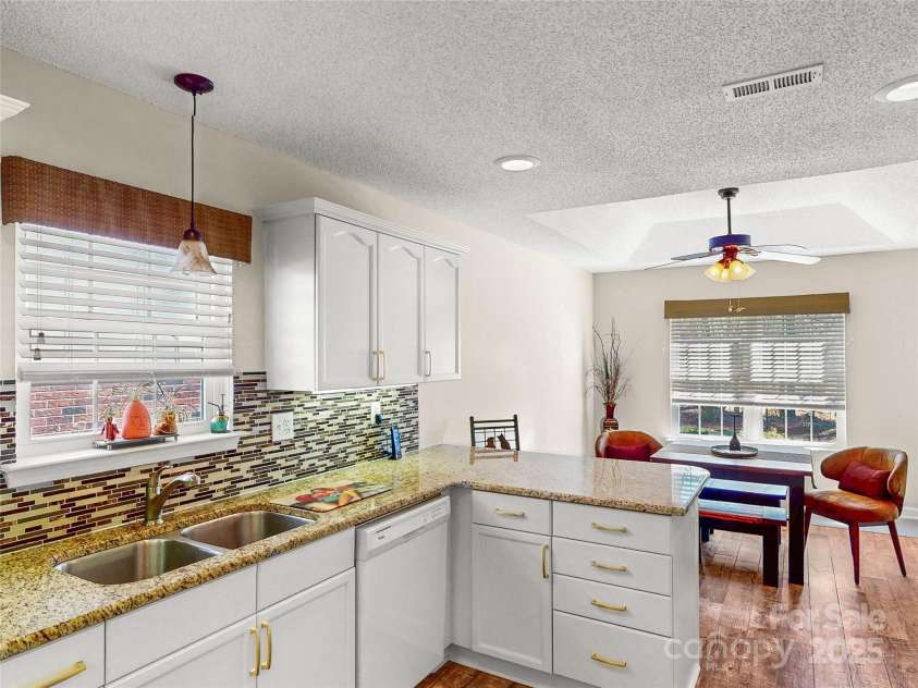 115 Keswick Lane, Mooresville, NC 28117.  MLS# CAR4245086, YatesRealty ID 9299. Plank style tile flooring!