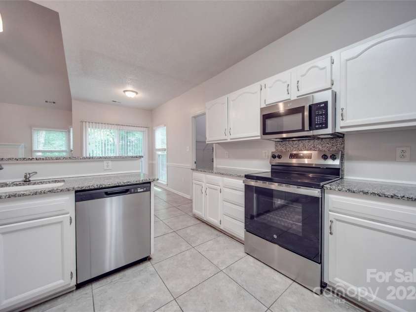 6232 Hickory Cove Lane, Charlotte, NC 28269.  MLS# CAR4151854, YatesRealty ID 9301. 