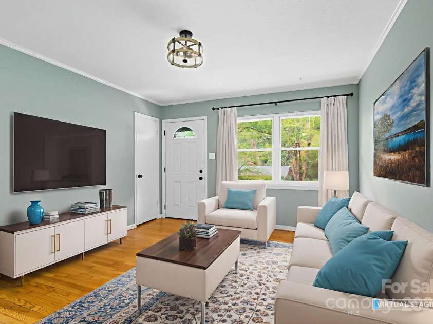 51 Campground Road, Asheville, NC 28805.  MLS# CAR4274929, YatesRealty ID 9303. Virtually staged front living room