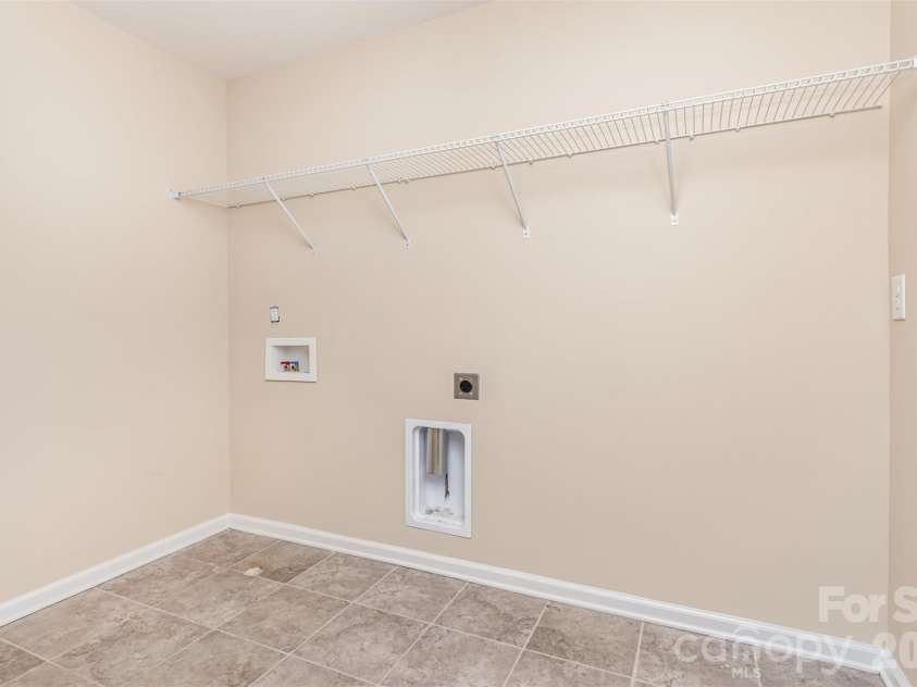161 Wrangell Drive, Mooresville, NC 28117.  MLS# CAR4352268, YatesRealty ID 9309. Laundry Room 