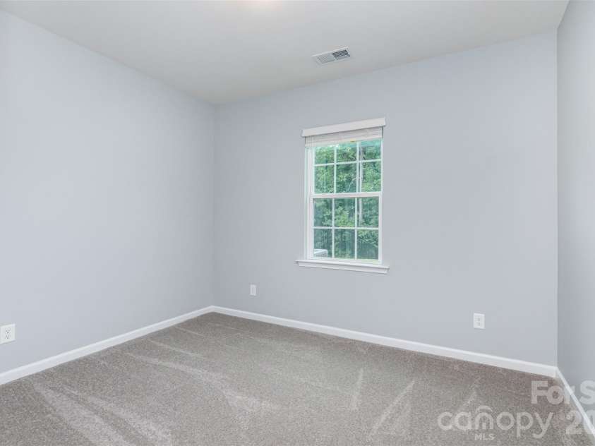 161 Wrangell Drive, Mooresville, NC 28117.  MLS# CAR4352268, YatesRealty ID 9309. Main Level Bedroom