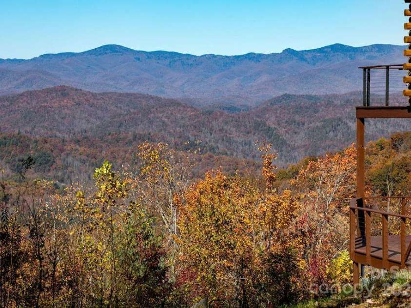 85 Ridge Road, Rosman, NC 28772.  MLS# CAR4314913, YatesRealty ID 9317. Decks and View