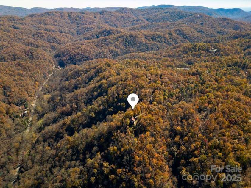 85 Ridge Road, Rosman, NC 28772.  MLS# CAR4314913, YatesRealty ID 9317. Extremely Private
