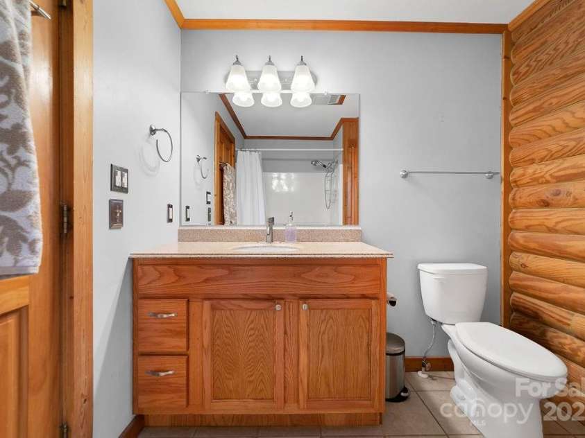 85 Ridge Road, Rosman, NC 28772.  MLS# CAR4314913, YatesRealty ID 9317. Main Level Full Bath