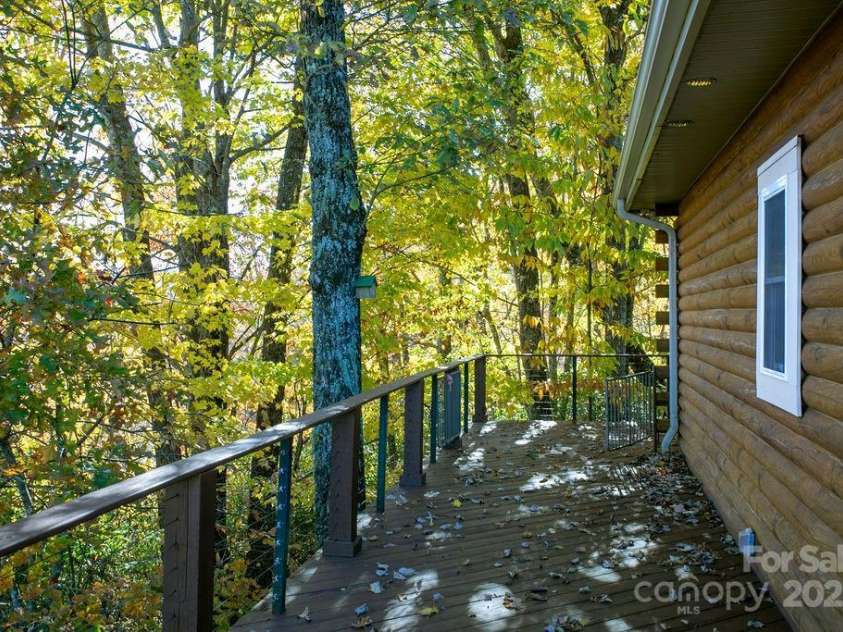 85 Ridge Road, Rosman, NC 28772.  MLS# CAR4314913, YatesRealty ID 9317. Side Entrance Deck