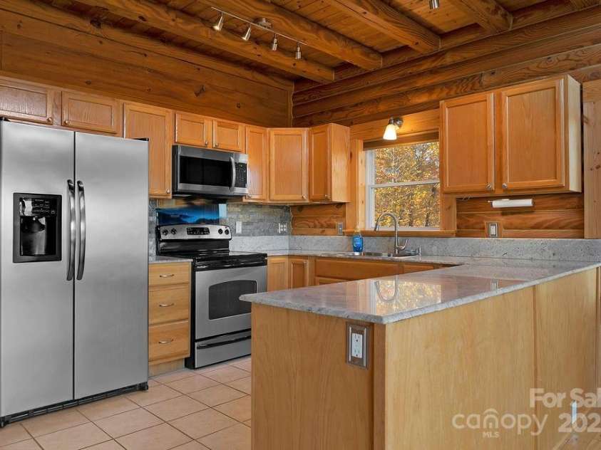 85 Ridge Road, Rosman, NC 28772.  MLS# CAR4314913, YatesRealty ID 9317. Spacious Kitchen