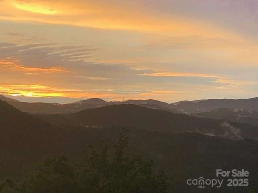 85 Ridge Road, Rosman, NC 28772.  MLS# CAR4314913, YatesRealty ID 9317. Sunset