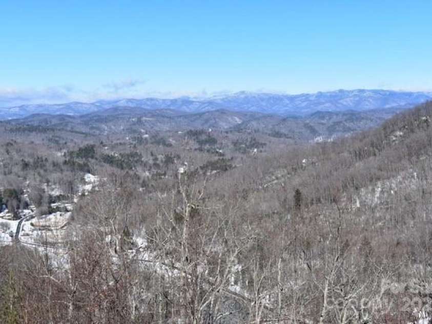 85 Ridge Road, Rosman, NC 28772.  MLS# CAR4314913, YatesRealty ID 9317. View with Snow