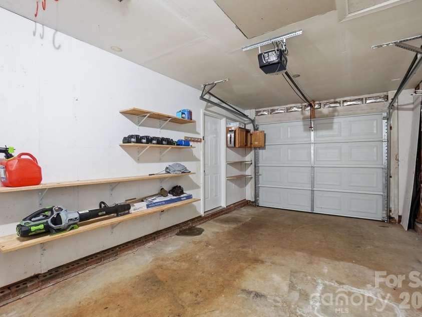 8912 Danson Drive, Charlotte, NC 28277.  MLS# CAR4364378, YatesRealty ID 9321. Clean, functional garage space with room for storage and everyday convenience.