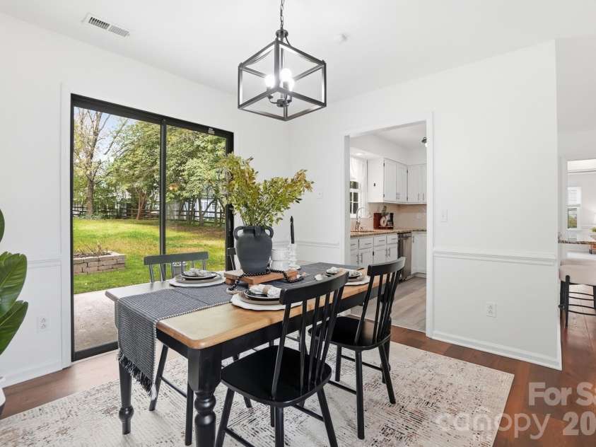 8912 Danson Drive, Charlotte, NC 28277.  MLS# CAR4364378, YatesRealty ID 9321. Dedicated dining space with natural light and views of the backyard—perfect for hosting.