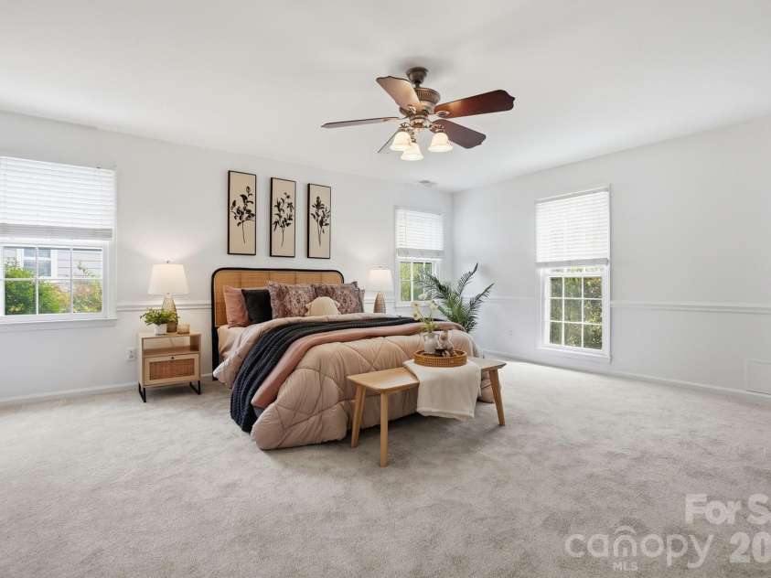 8912 Danson Drive, Charlotte, NC 28277.  MLS# CAR4364378, YatesRealty ID 9321. Generously sized primary suite with new carpet (2026) and a calm, neutral palette.