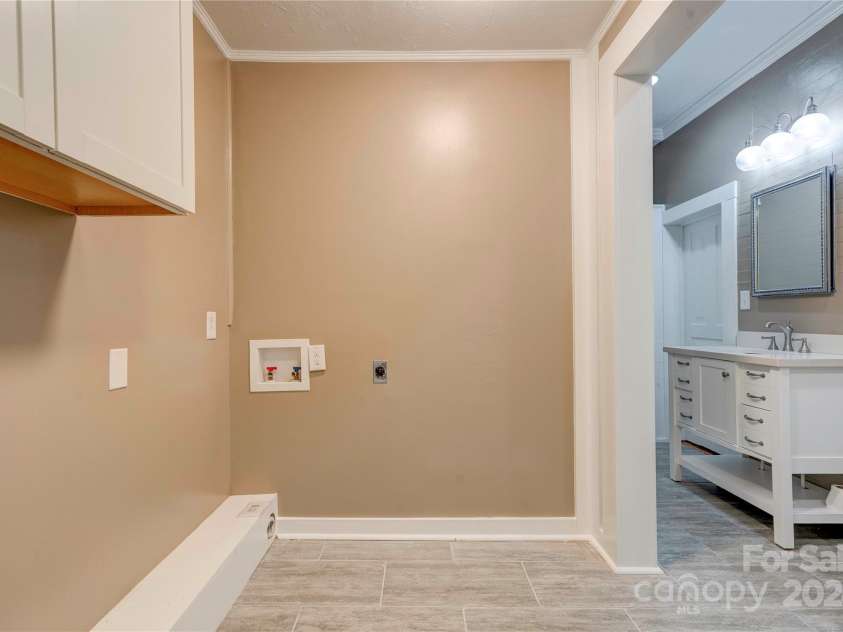 824 Stagecoach Trail, Lawndale, NC 28090.  MLS# CAR4157465, YatesRealty ID 9322. Laundry Area off Primary Bath