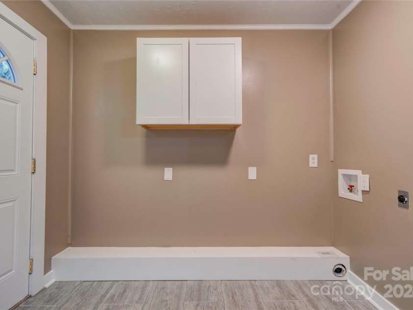 824 Stagecoach Trail, Lawndale, NC 28090.  MLS# CAR4157465, YatesRealty ID 9322. Laundry Area Off Primary Bath
