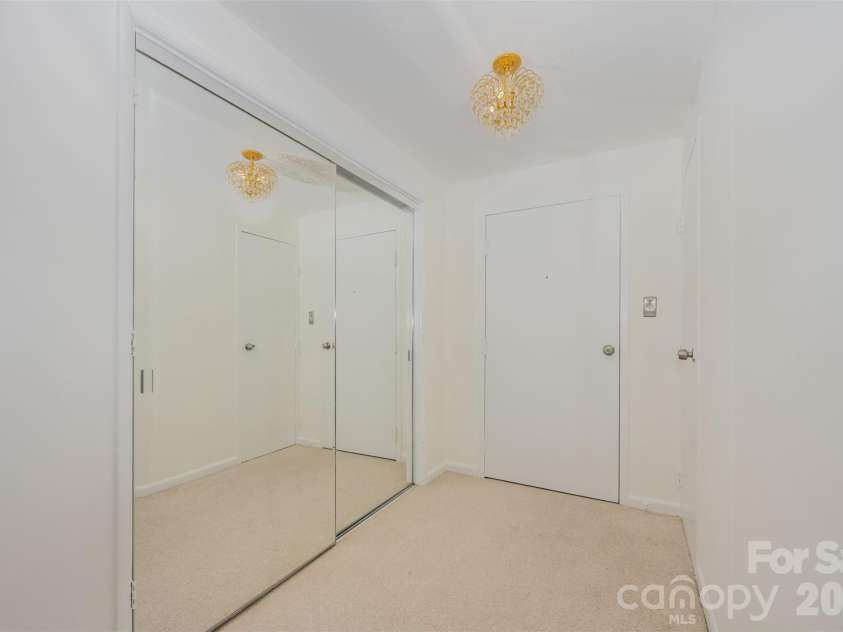 1300 Reece Road, Charlotte, NC 28209.  MLS# CAR4322239, YatesRealty ID 9326. Foyer entrance