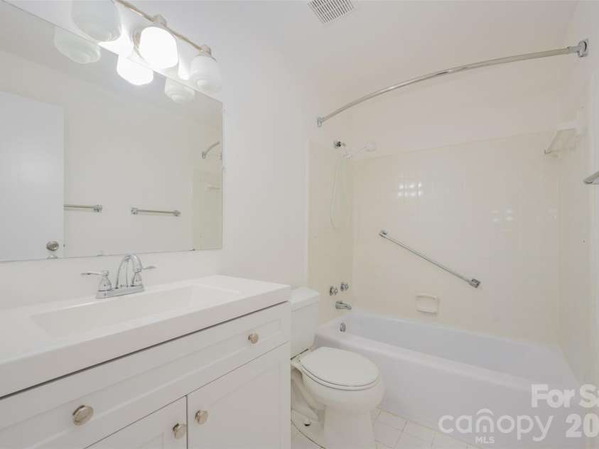 1300 Reece Road, Charlotte, NC 28209.  MLS# CAR4322239, YatesRealty ID 9326. Full bath with new vanity 