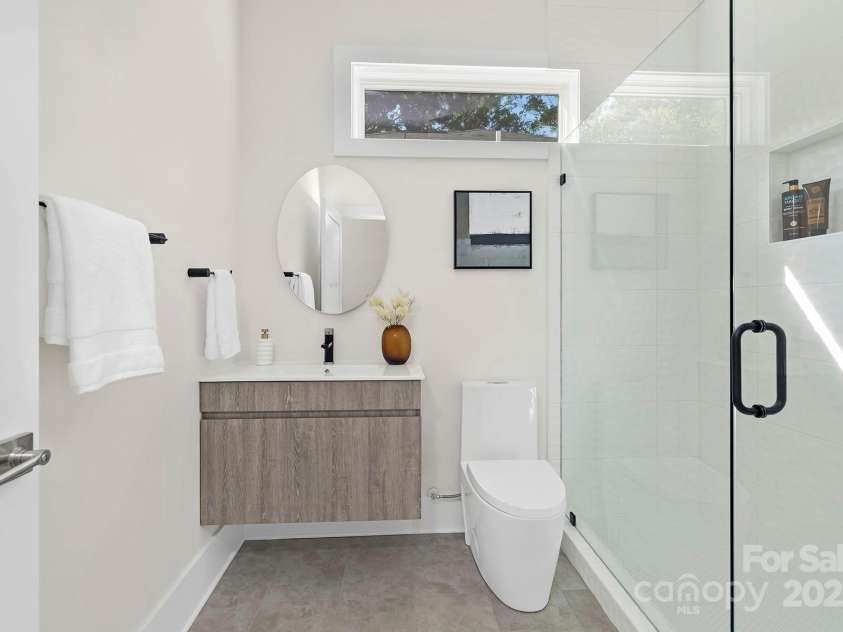 2414 7th Street, Charlotte, NC 28204.  MLS# CAR4320000, YatesRealty ID 9329. Every bathroom showcases thoughtful design and elevated materials