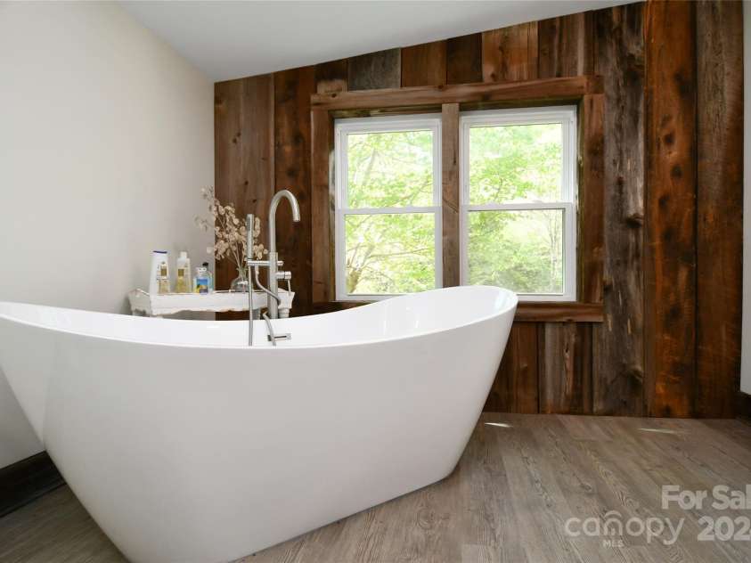 2180 Pigeon Roost Road, Green Mountain, NC 28740.  MLS# CAR4137054, YatesRealty ID 9333. There is room for two in this tub!