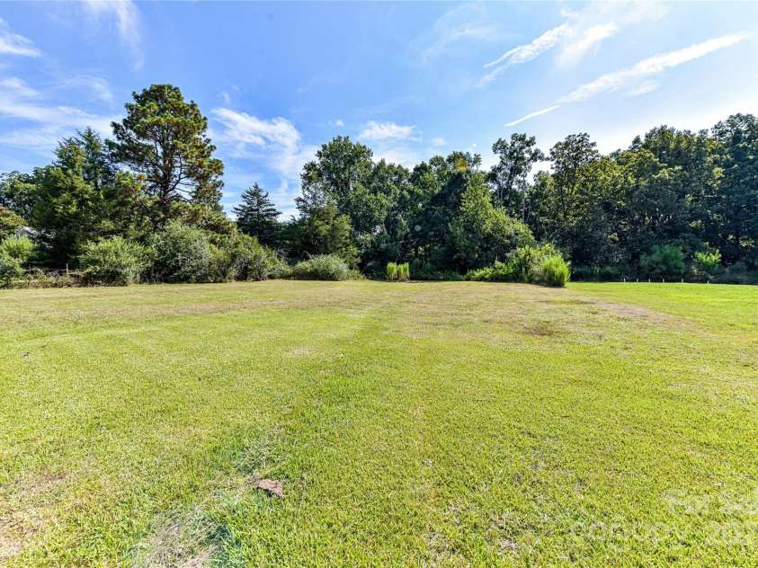 1021 Cyrus Edwards Road, Monroe, NC 28110.  MLS# CAR4314591, YatesRealty ID 9336. Back Yard view