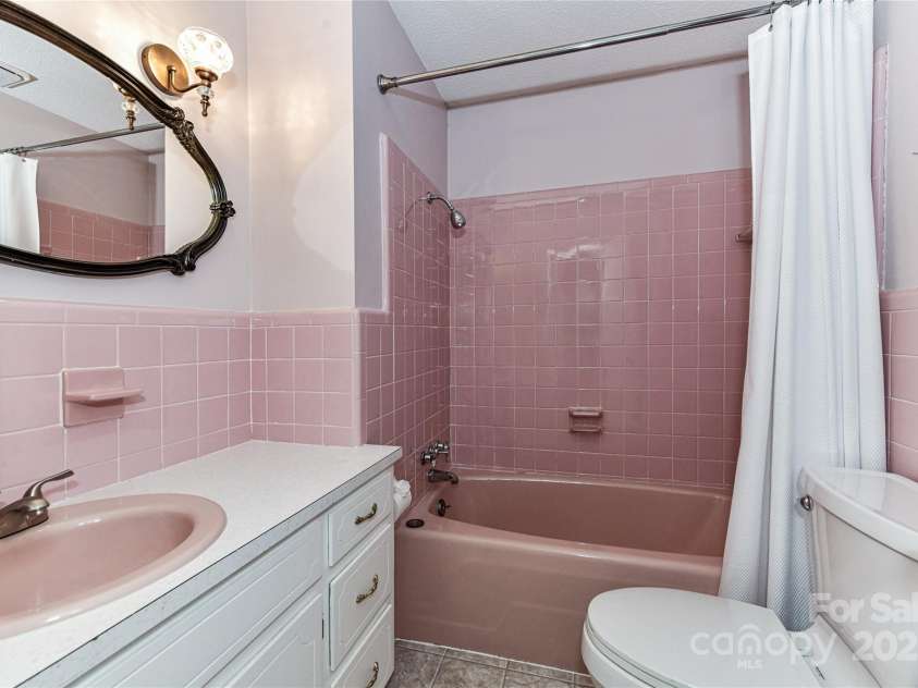 1021 Cyrus Edwards Road, Monroe, NC 28110.  MLS# CAR4314591, YatesRealty ID 9336. Hall bathroom