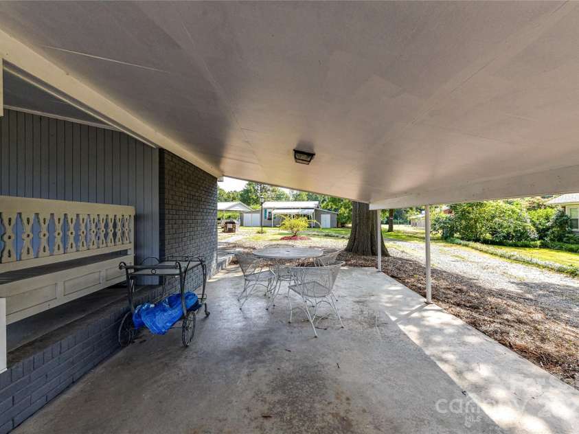 1021 Cyrus Edwards Road, Monroe, NC 28110.  MLS# CAR4314591, YatesRealty ID 9336. Side patio