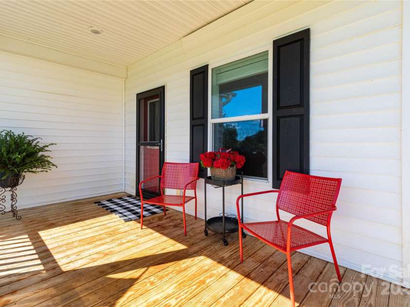 653 Mag Sluder Road, Alexander, NC 28701.  MLS# CAR4299475, YatesRealty ID 934. Covered Front Porch