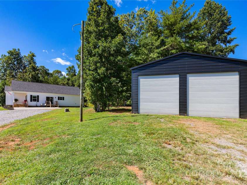 653 Mag Sluder Road, Alexander, NC 28701.  MLS# CAR4299475, YatesRealty ID 934. Detached garage 