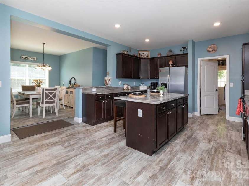 653 Mag Sluder Road, Alexander, NC 28701.  MLS# CAR4299475, YatesRealty ID 934. Open concept kitchen into dining area