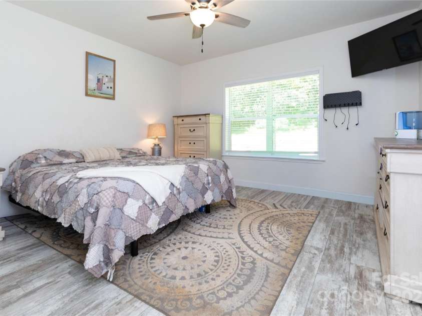 653 Mag Sluder Road, Alexander, NC 28701.  MLS# CAR4299475, YatesRealty ID 934. Primary bedroom