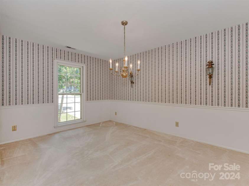 200 Linville Drive, Matthews, NC 28105.  MLS# CAR4178988, YatesRealty ID 9342. 