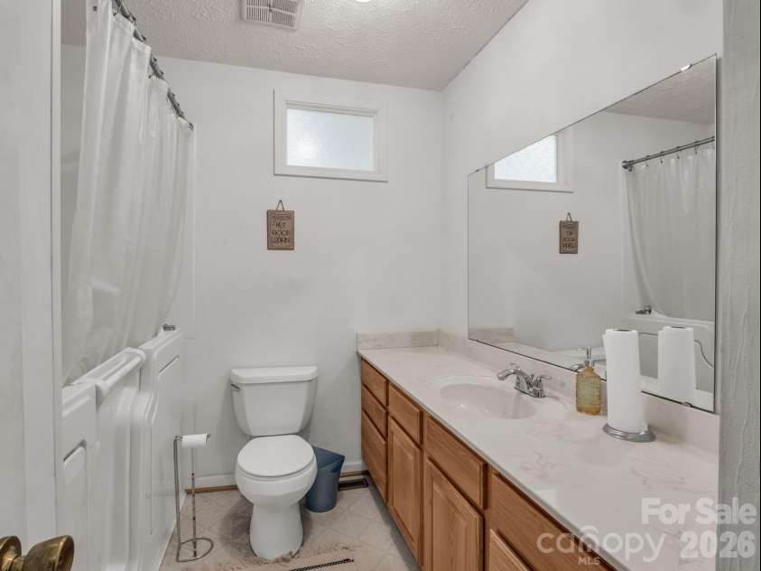 755 Mount Olivet Road, Zirconia, NC 28790.  MLS# CAR4336609, YatesRealty ID 9345. Full hall bath