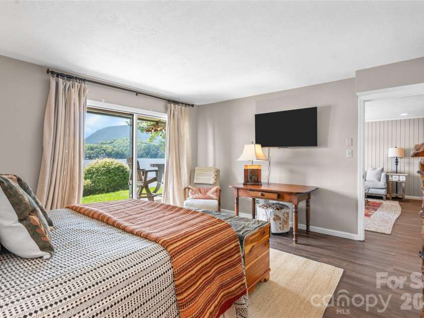 68 Toxaway Point, Lake Toxaway, NC 28747.  MLS# CAR4409256, YatesRealty ID 9348. 