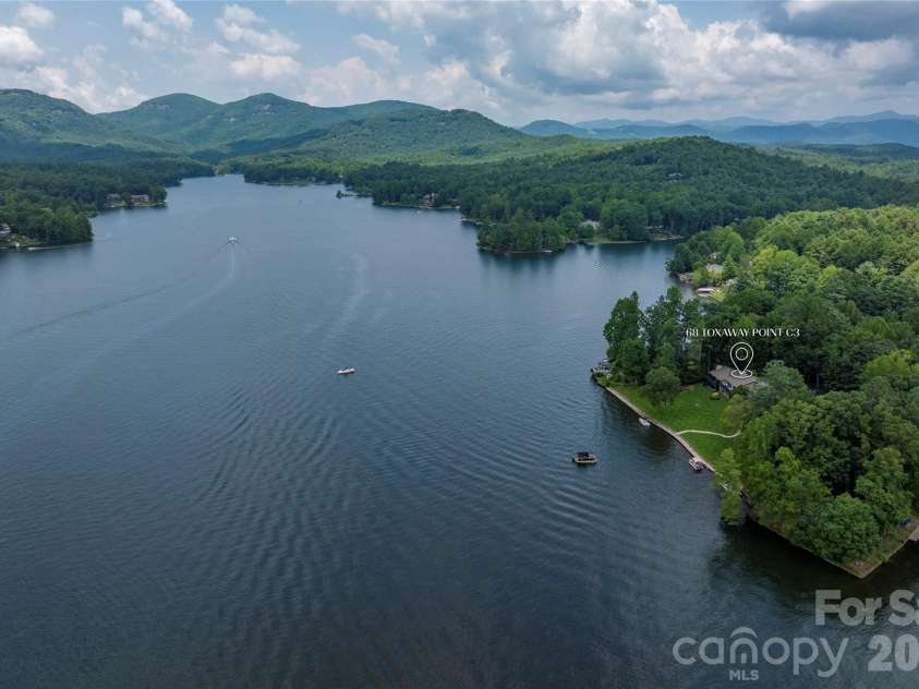 68 Toxaway Point, Lake Toxaway, NC 28747.  MLS# CAR4409256, YatesRealty ID 9348. 